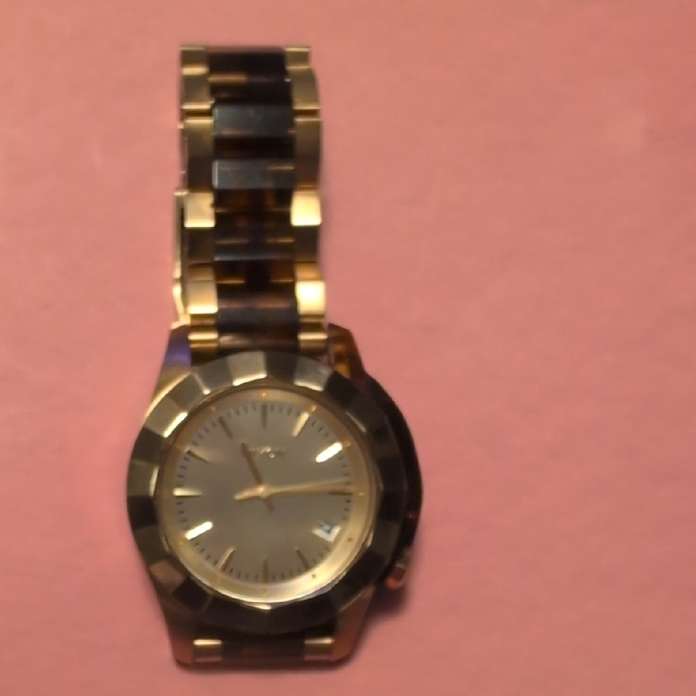 Nixon Gold and Brown Classic Analog Watch